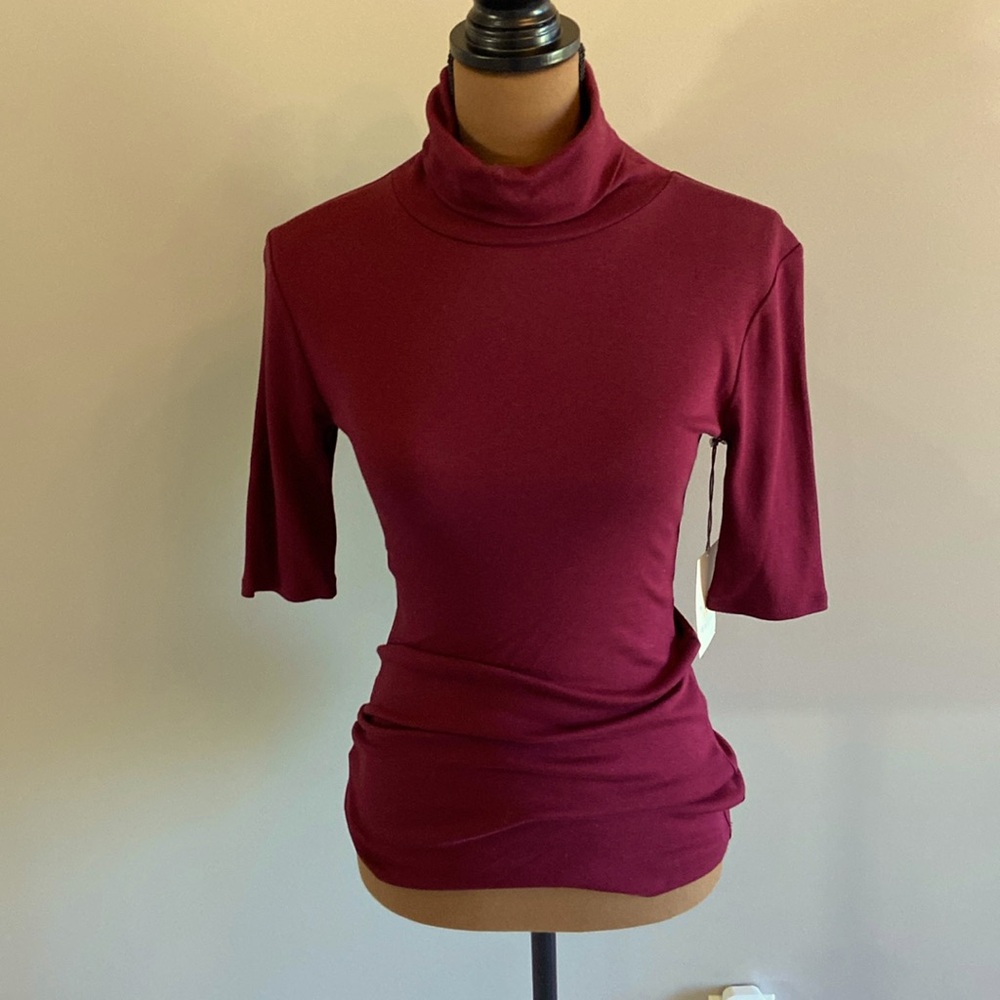 3/4 sleeve turtle neck, size small, burgundy color.